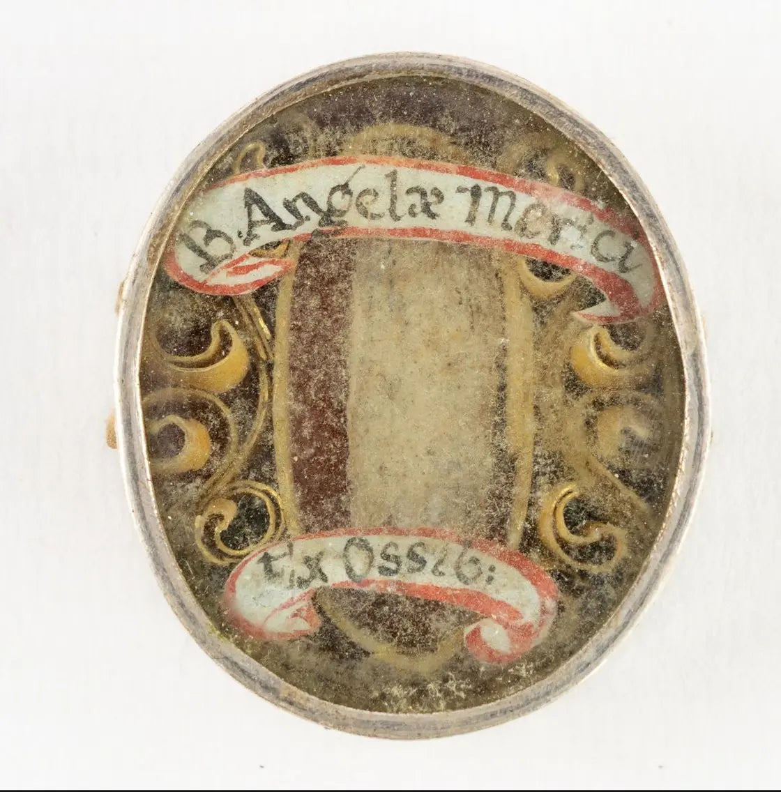 Relic of Blessed Angela Merici ex ossibus in oval reliquary
/
Relique de la bienheureuse Angèle Merici ex ossibus dans reliquaire ovale