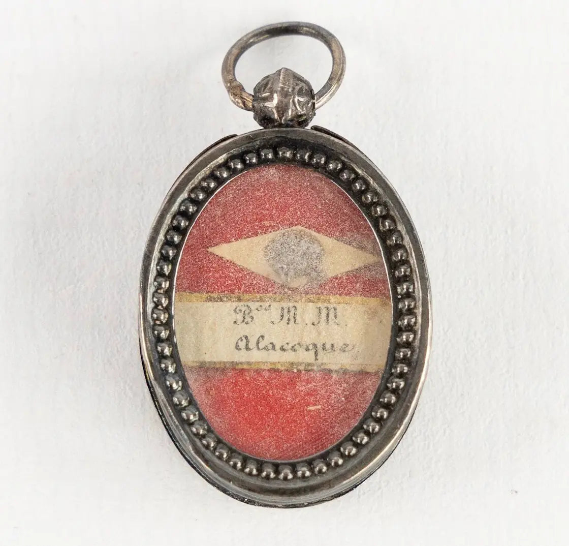 Pendant reliquary with relic of Blessed Margaret Mary Alacoque
/
Reliquaire pendentif avec relique de la Bienheureuse Marguerite Marie Alacoque