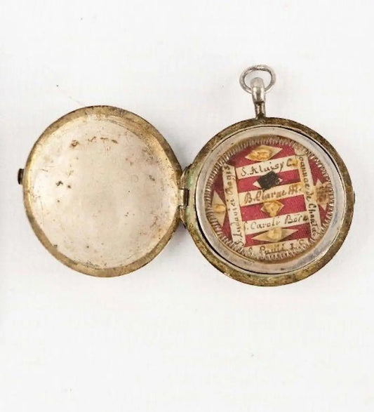 Antique multi-saint reliquary pendant with Saint Aloysius Gonzaga and Saint Charles Borromeo
/
Ancien reliquaire pendentif multi-reliques avec saint Louis de Gonzague et saint Charles Borromée