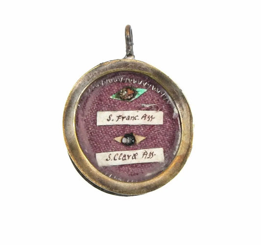 Double relic of Saint Francis and Saint Clare of Assisi in antique sealed reliquary
/
Reliquaire ancien avec reliques de Saint François d’Assise et Sainte Claire d’Assise