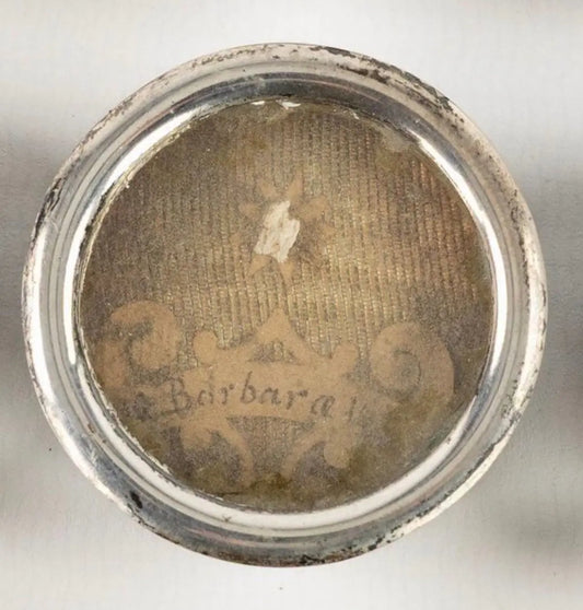 Saint Barbara relic reliquary in silvered metal
/
Reliquaire de sainte Barbe en métal argenté